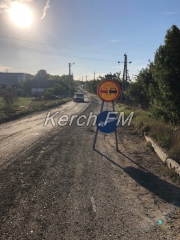 Новости » Общество: Ремонт дорог добрался до Партизанского