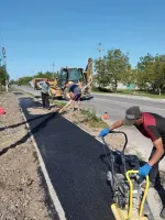 Новости » Общество: В Аджимушкае приступили к асфальтированию пешеходных дорожек