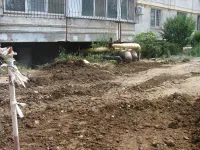 Новости » Общество: Тепловики восстанавливают внутриквартальный проезд у дома № 14 по Генерала Петрова
