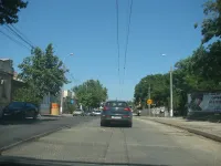 В Керчи по улице Свердлова первый слой асфальта уложили до середины куоровского кольца
