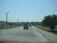 Новости » Общество: На Куль-Обинском шоссе в Керчи полностью уложили верхний слой асфальта