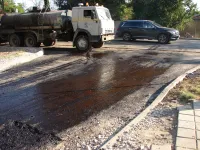 Новости » Общество: В районе Сморжевского в Керчи сегодня асфальтируют съезды