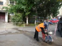 Во дворе по Сморжевского, 4 в Керчи часть трубы отопления будут менять