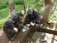 Новости » Общество: У библиотеки-филиала №2 в Керчи делают отмостки и ливневку с подпорной стеной